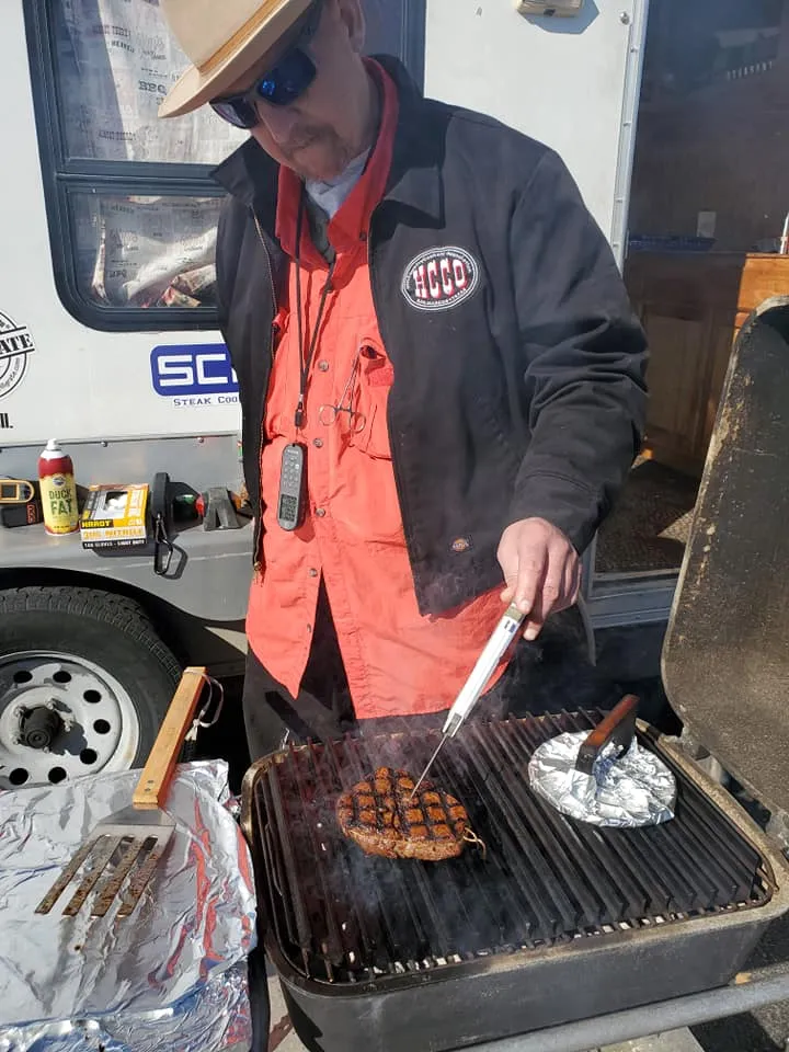 Gene Potts cooking at a grill