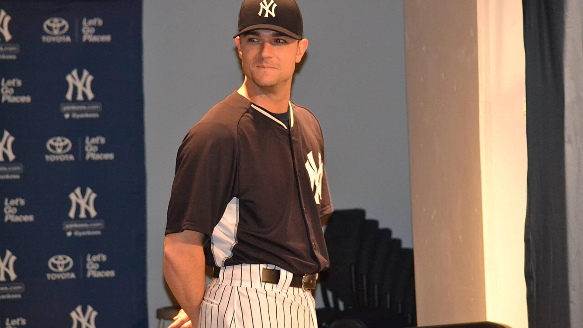 Robertson Plays Catch With "No Pain"