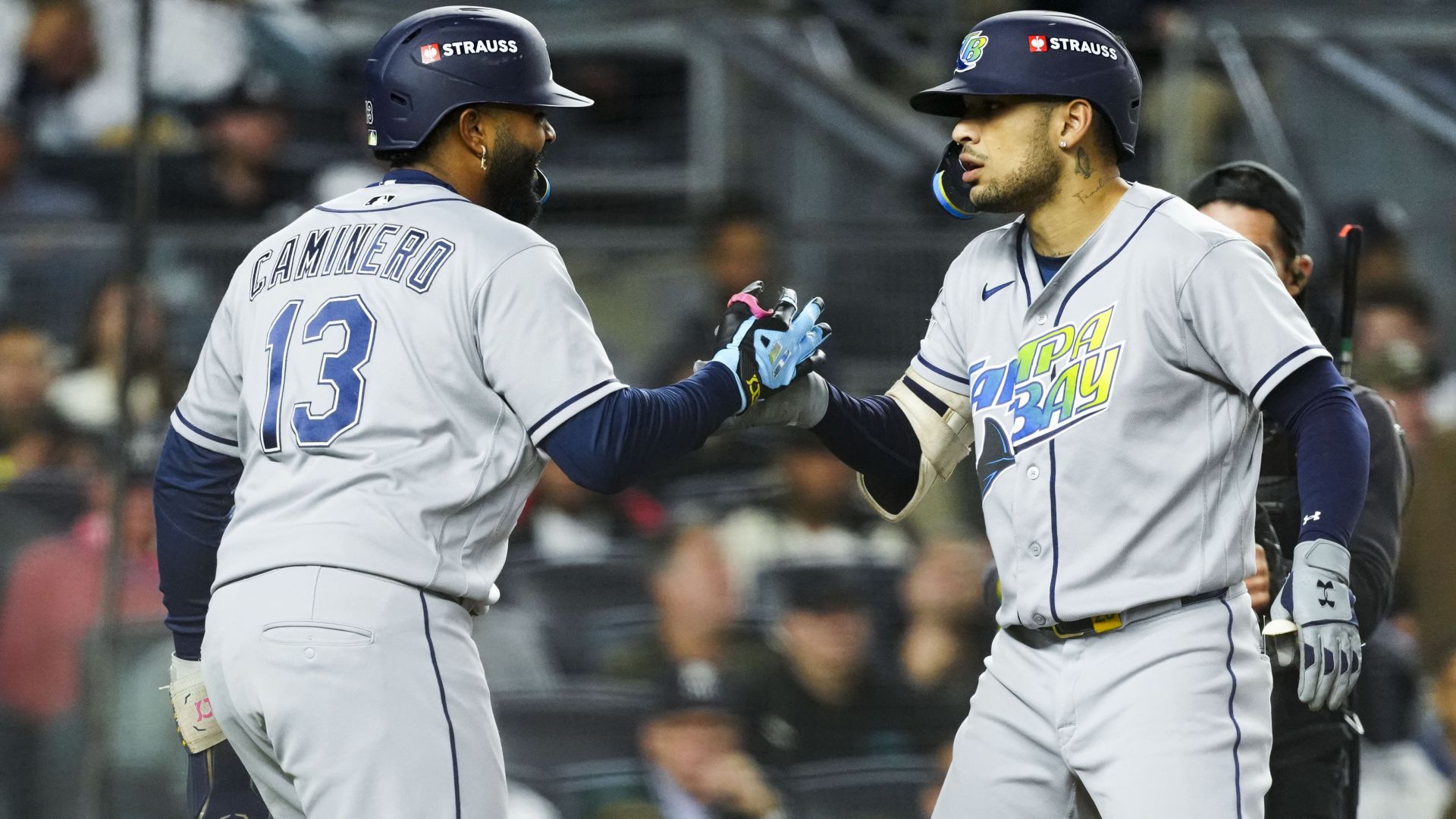 Rays sweep past Yankees in wild night in Bronx