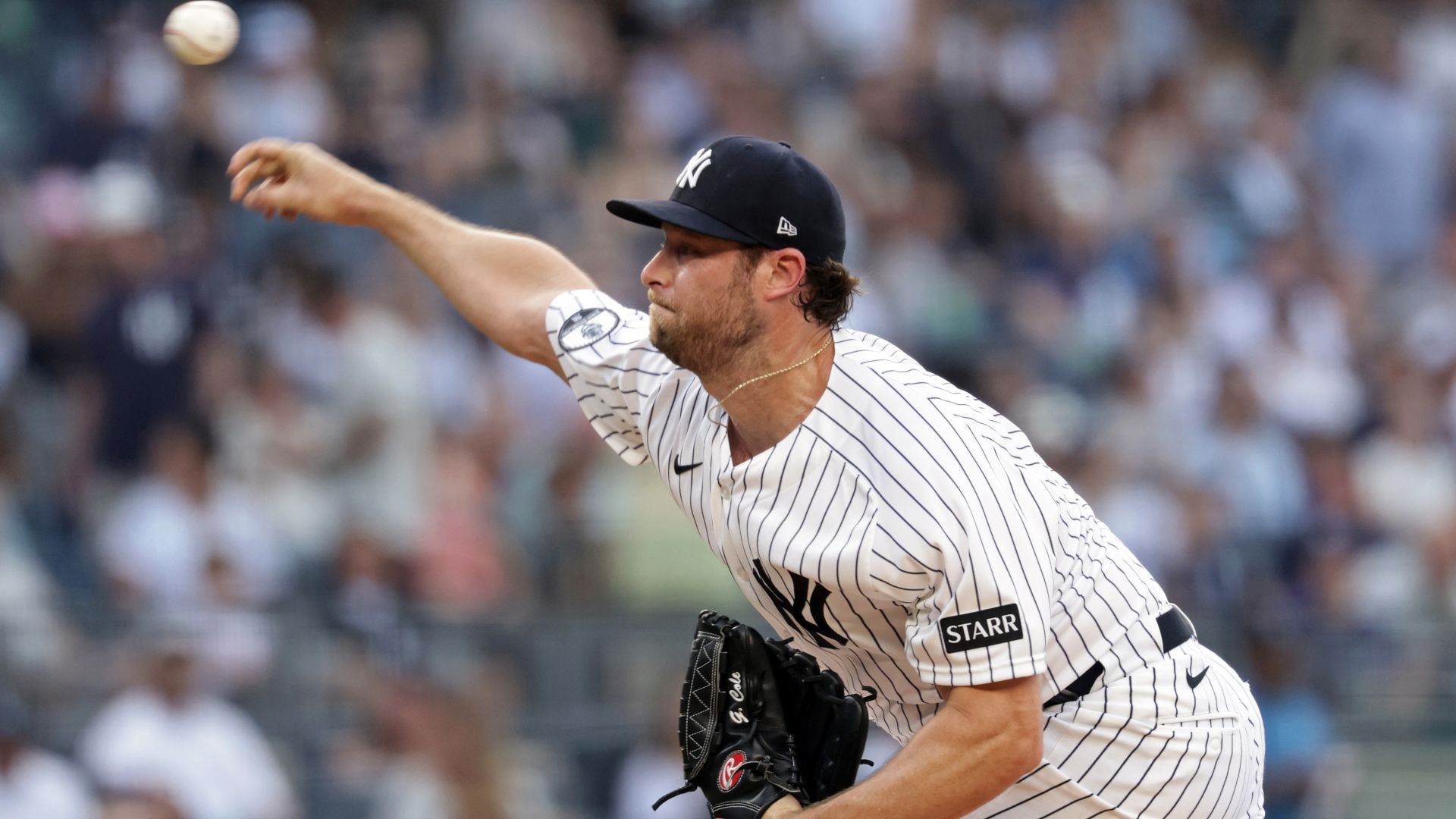 Cole defies weather, Boone's hook to help Yankees snap skid
