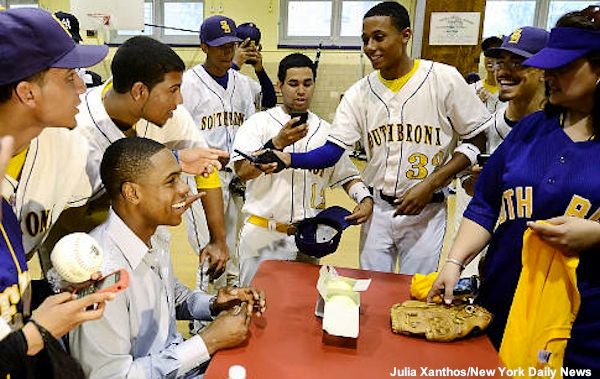 Yankees center fielder Curtis Granderson donates bats to the PSAL