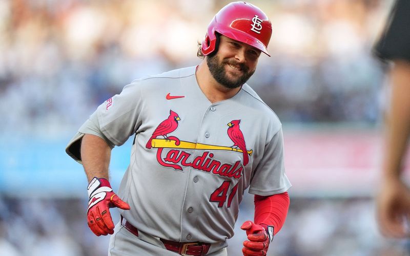 Still a Cardinal after Deadline, Burleson rewards club with 3-HR game