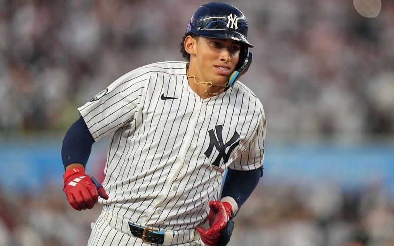 What a debut! Lombard homers for 1st hit, shines on 'D' to key Yankees' win