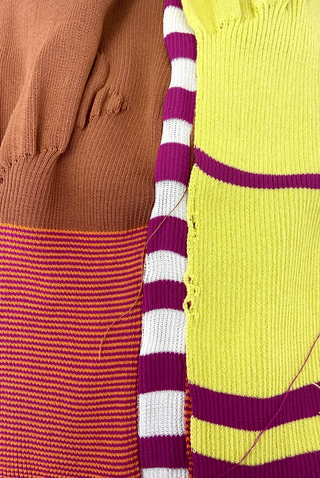 Close up image of three knitted fabrics that have been made from stripe and rib techniques.