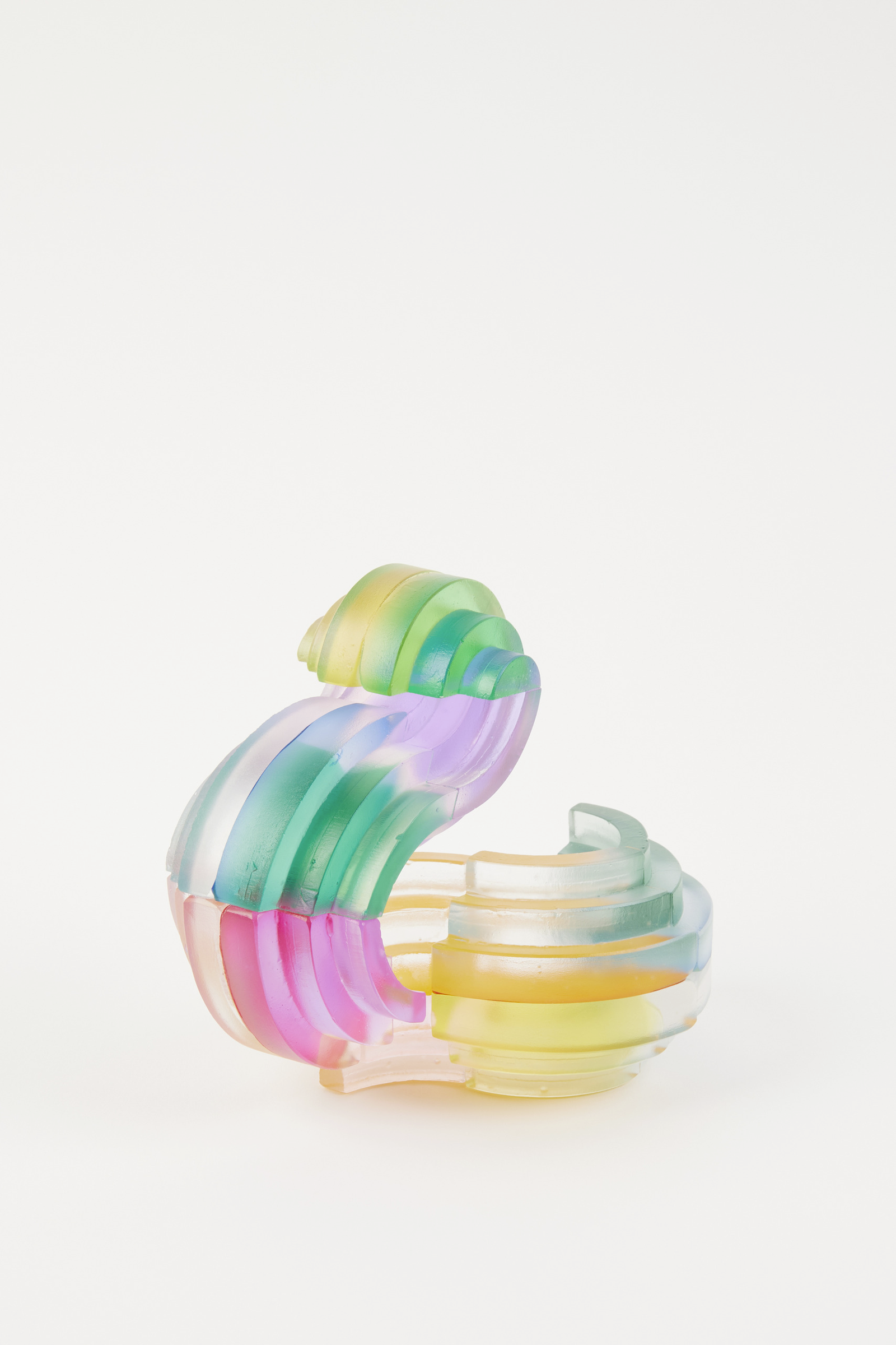 pulse is a cast glass sculpture made of multiple joined vibrant coloured segments that twist