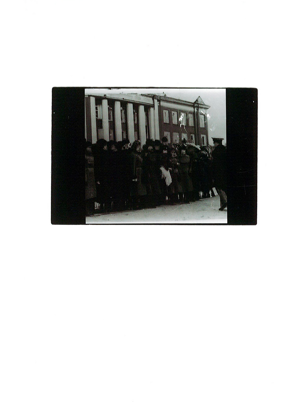 Archival display of an envelope and a photograph of the Seven Sisiters building in Moscow