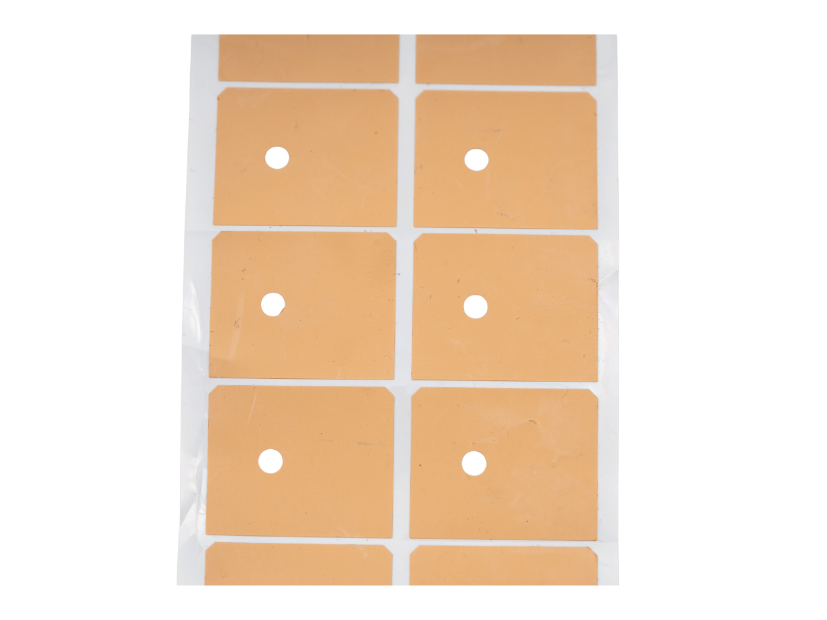 Electrically insulating thermal interface pads