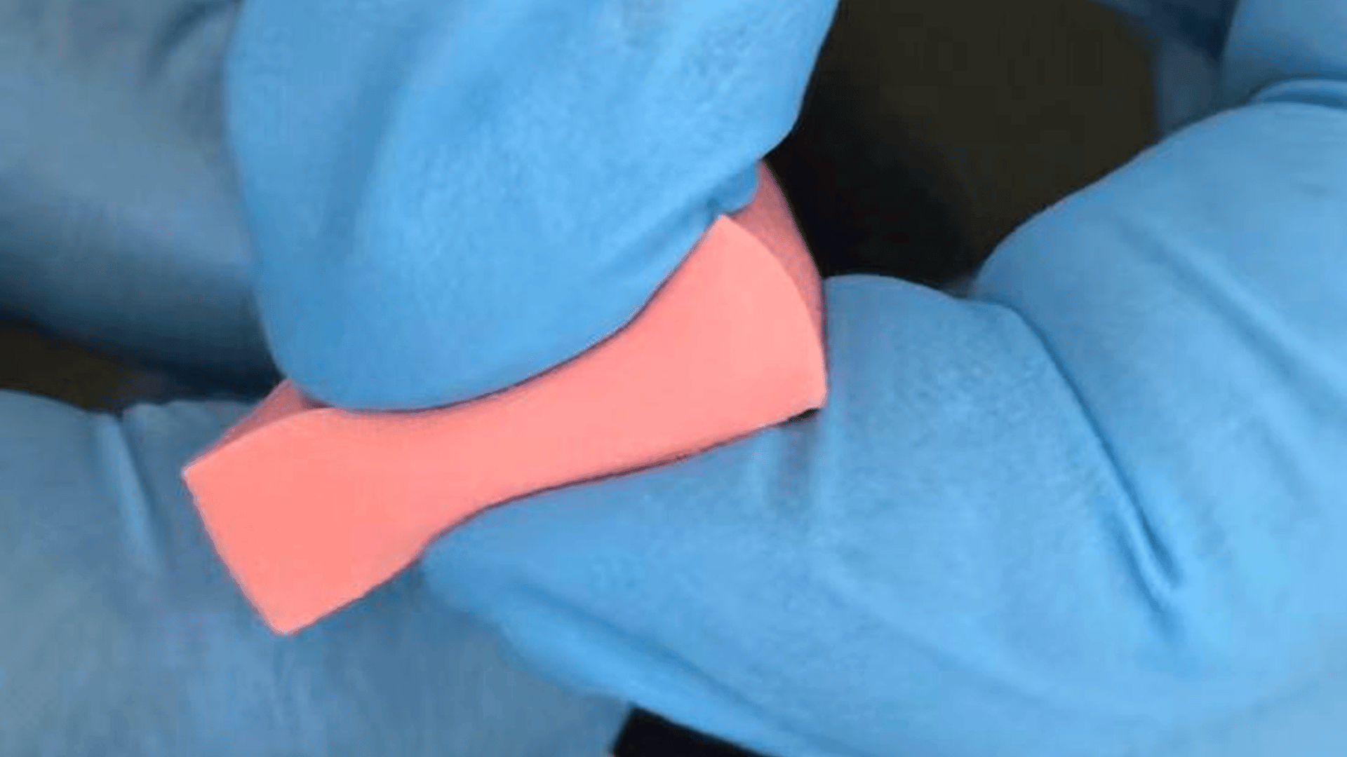 Gap pad compressing and conforming under light pressure