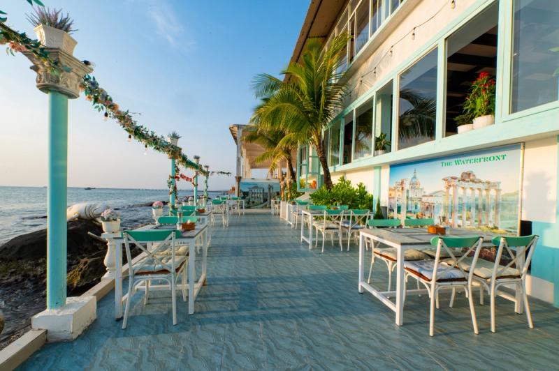 Seaside terrace and The Waterfront signage