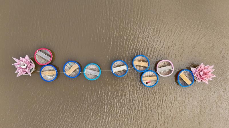 Empty round basket boats photographed from above on the water