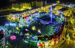 Grand World canal-side streets illuminated at night