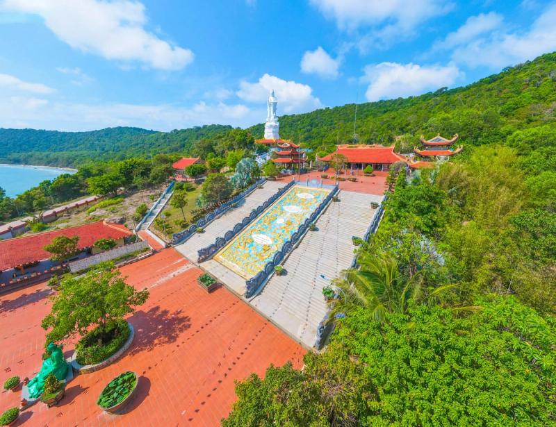 Ho Quoc Pagoda stairway, courtyard and wooded coastal setting