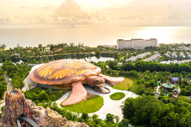 The turtle-shaped aquarium building among green gardens