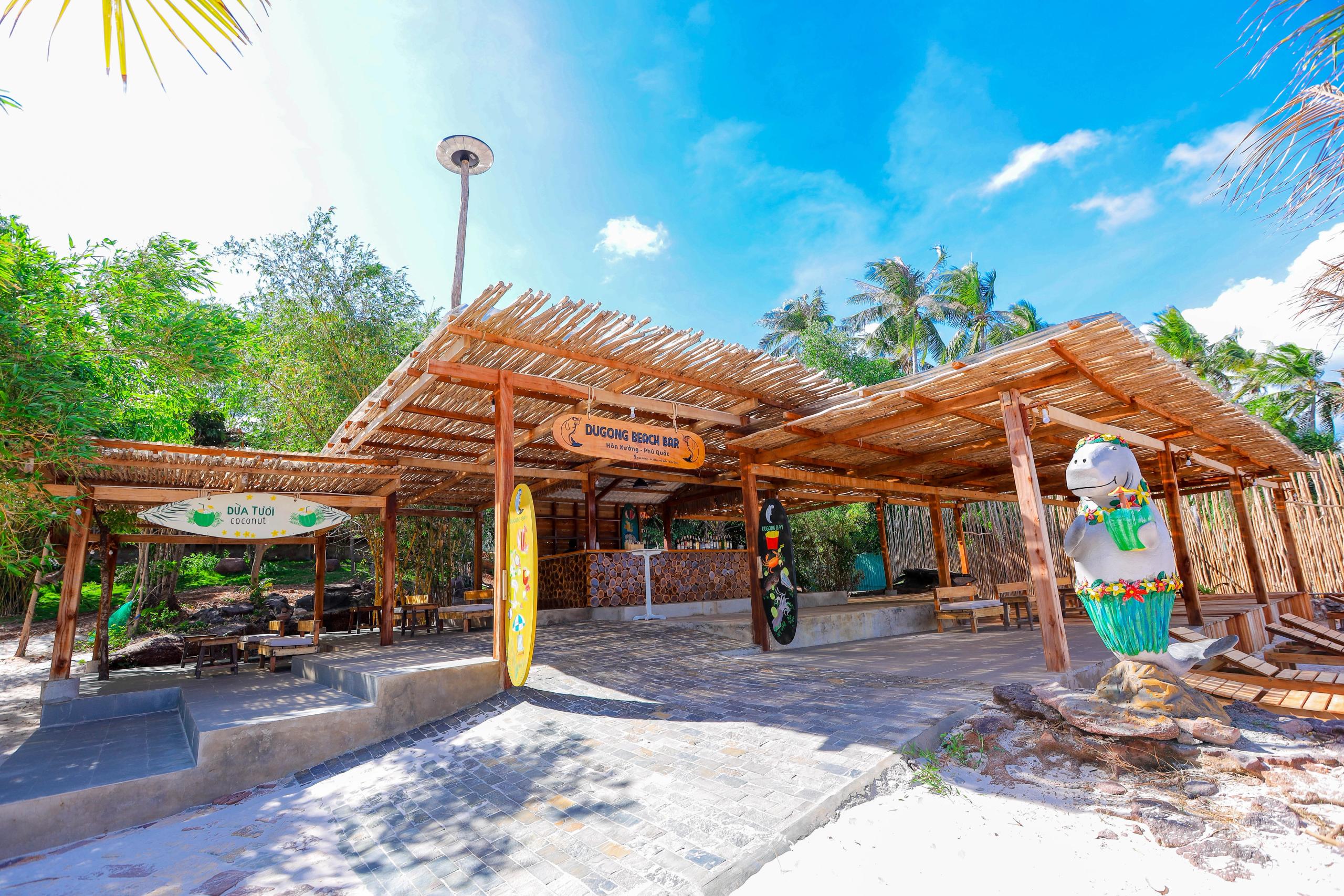 An open wooden beach-bar entrance