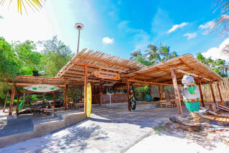 An open wooden beach-bar entrance