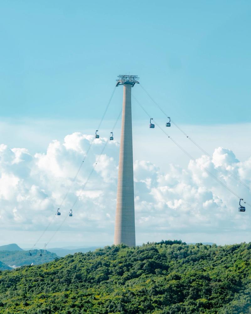 A cable-car tower above the island landscape on the Hòn Thơm crossing.