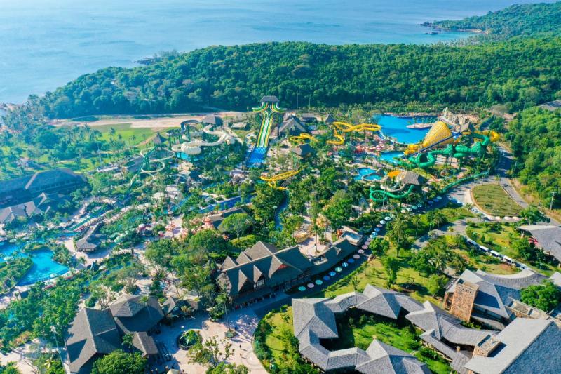 Aerial view of Aquatopia water park surrounded by greenery