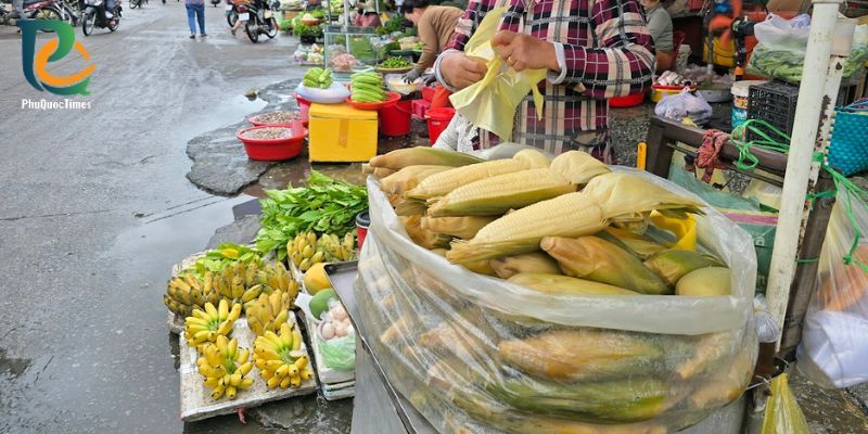 Corn, leafy vegetables and bananas at a Duong Dong produce stall