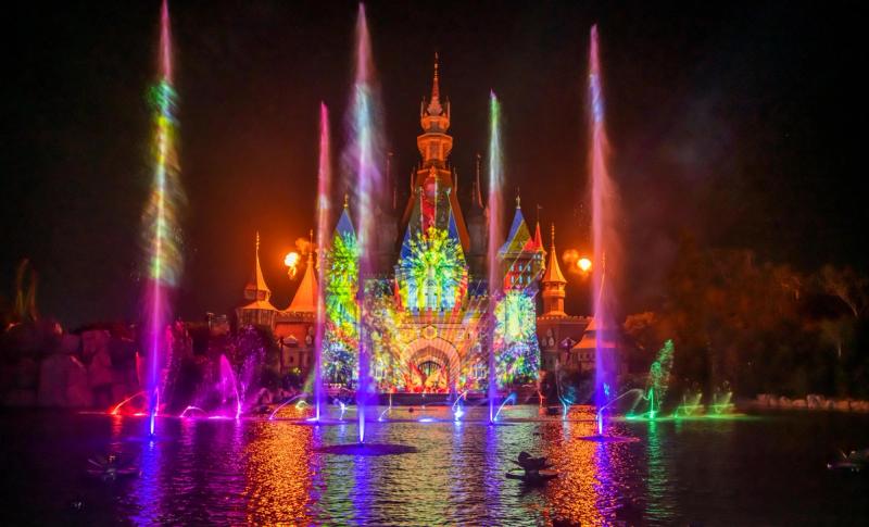 The VinWonders castle lit by fountains during the Once show