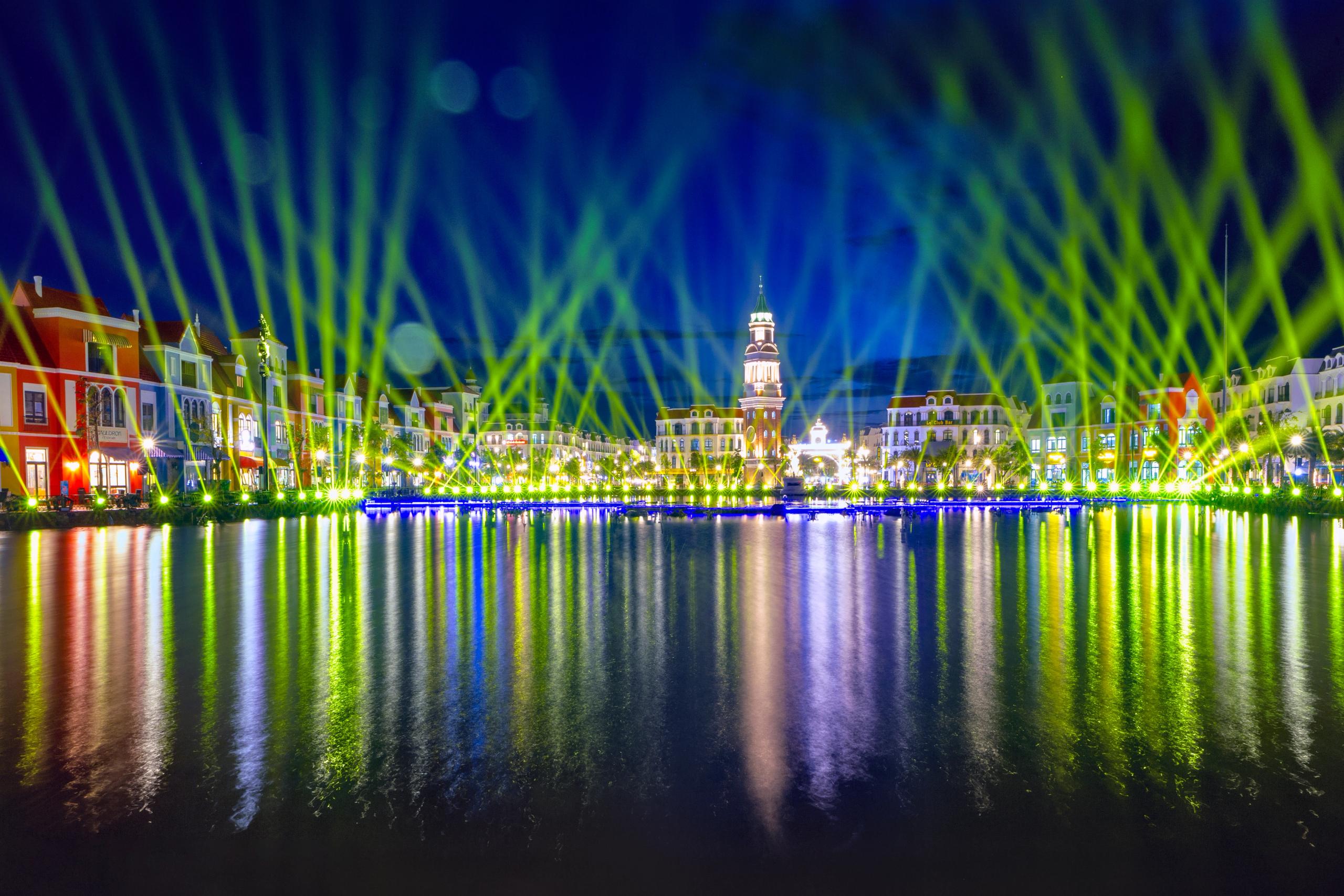 Laser beams across the Grand World water-show lake