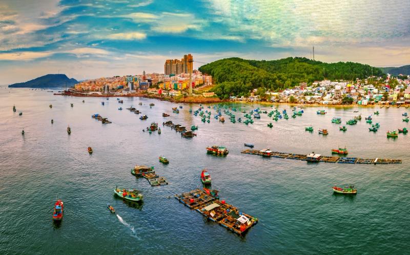 The working fishing harbour beside the Sunset Town district in An Thới; the harbour and themed visitor streets are different settings.
