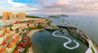 Sunset Town waterfront and Kiss Bridge seen from above