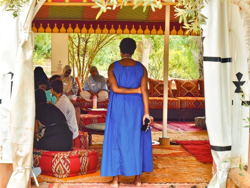 Women gathered in a Coffee Afrik healing circle