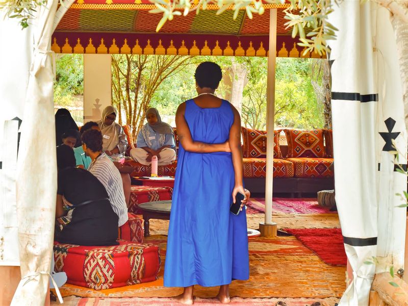 Women gathered in a Coffee Afrik healing circle