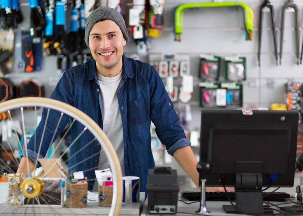 Retail salesman in bicycle store