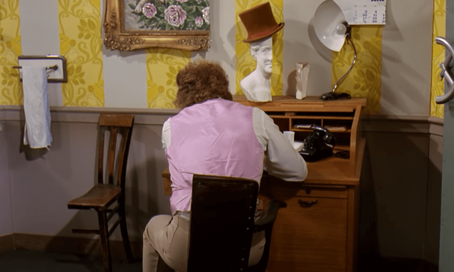 Willy Wonka at his desk.