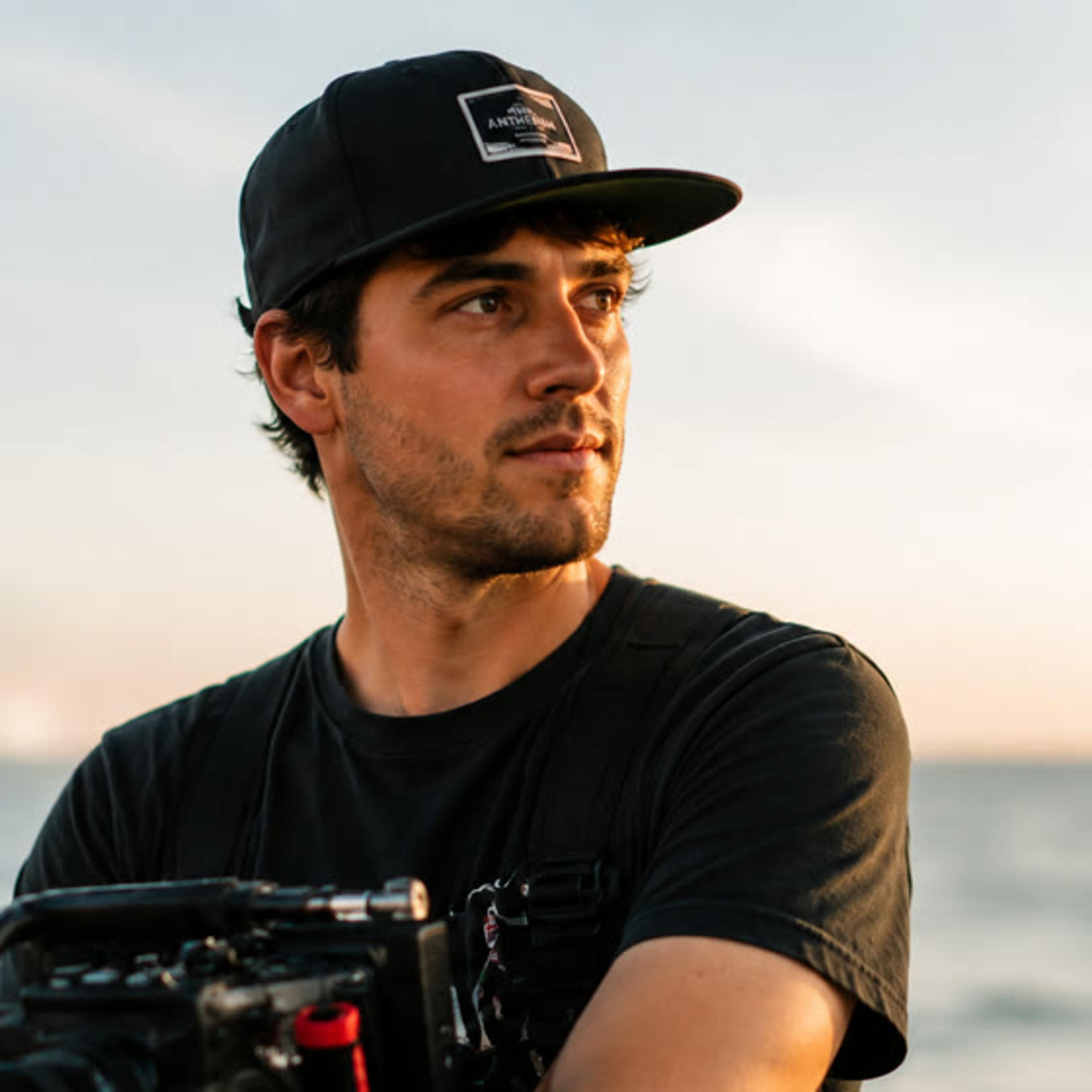 Director of photography operating a cinema camera