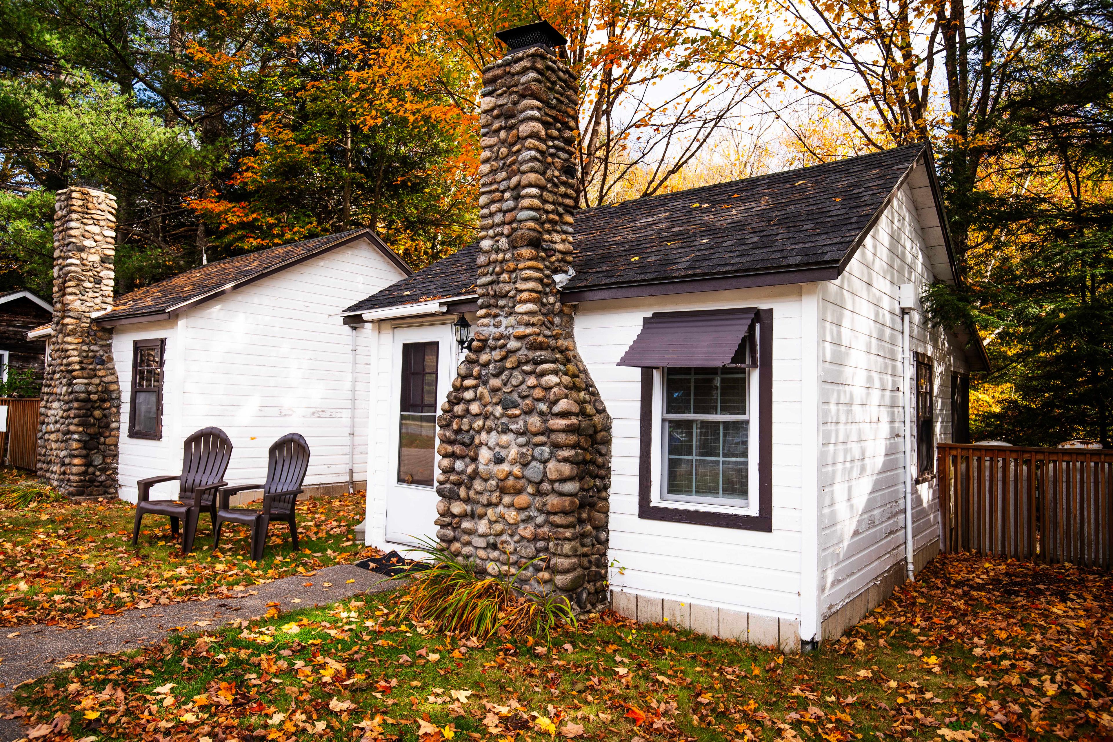 Romantic setting with rustic charm at The Basin cabin. #CabinRetreat #NatureEscape #CozyCabin #FireplaceNights