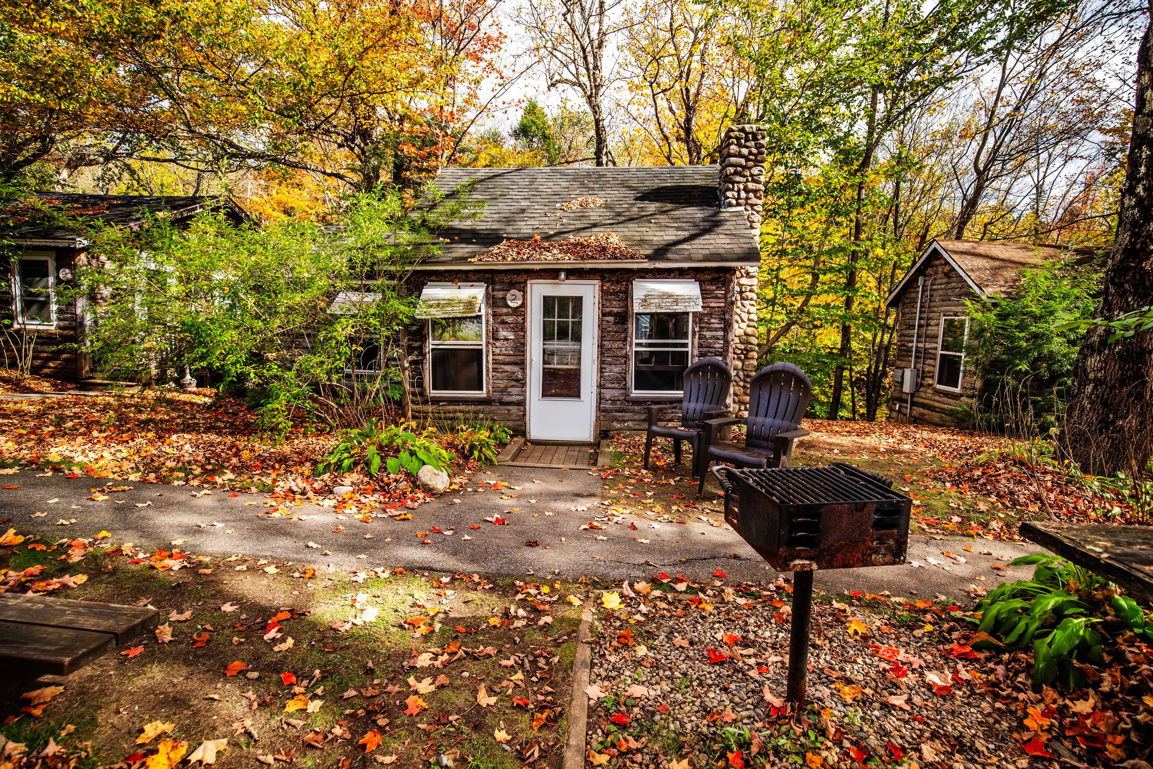 Riverfront cabin retreat at The Moose's Antler, nestled on the Pemigewasset River. #TheMoosesAntler #PemiCabins #EscapeToNature #FirewoodAvailable