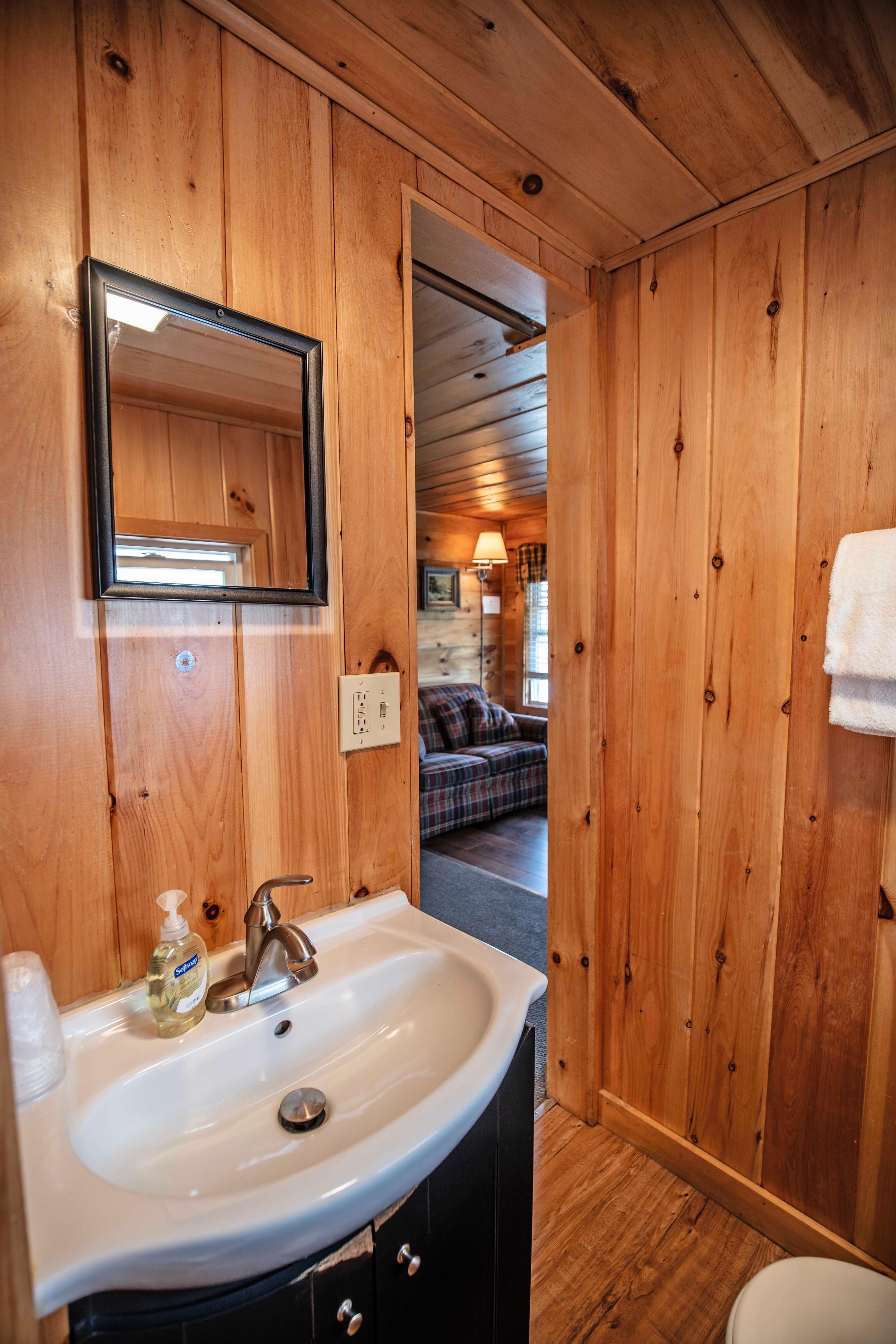 Cozy and inviting accommodations at The Flume cabin. #FullBathroom #HiddenGem #NatureBeauty