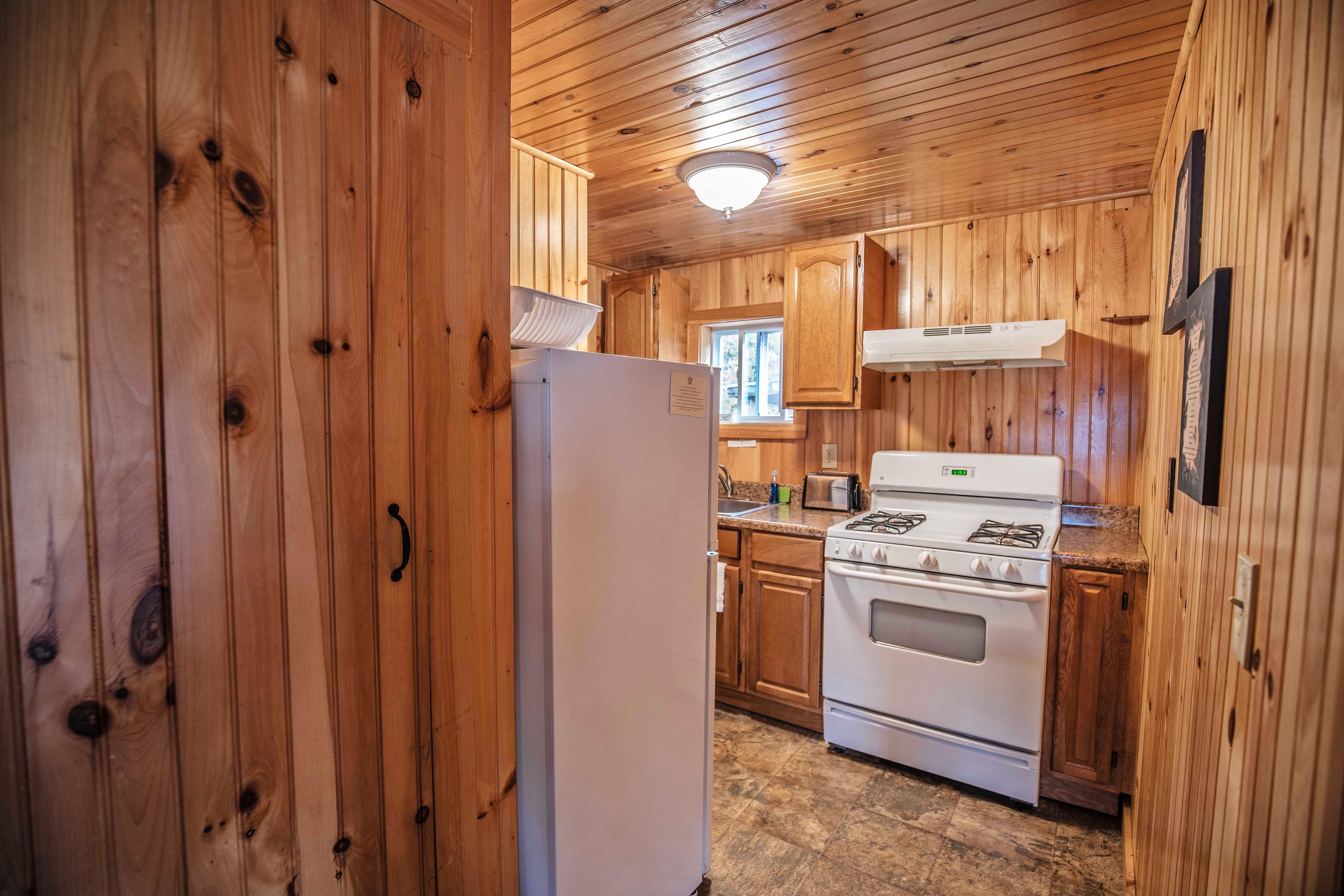 Thoughtfully designed kitchen area in The Pemi Trail. #TravelNewHampshire #ExploreNH #WeekendGetaway #Staycation