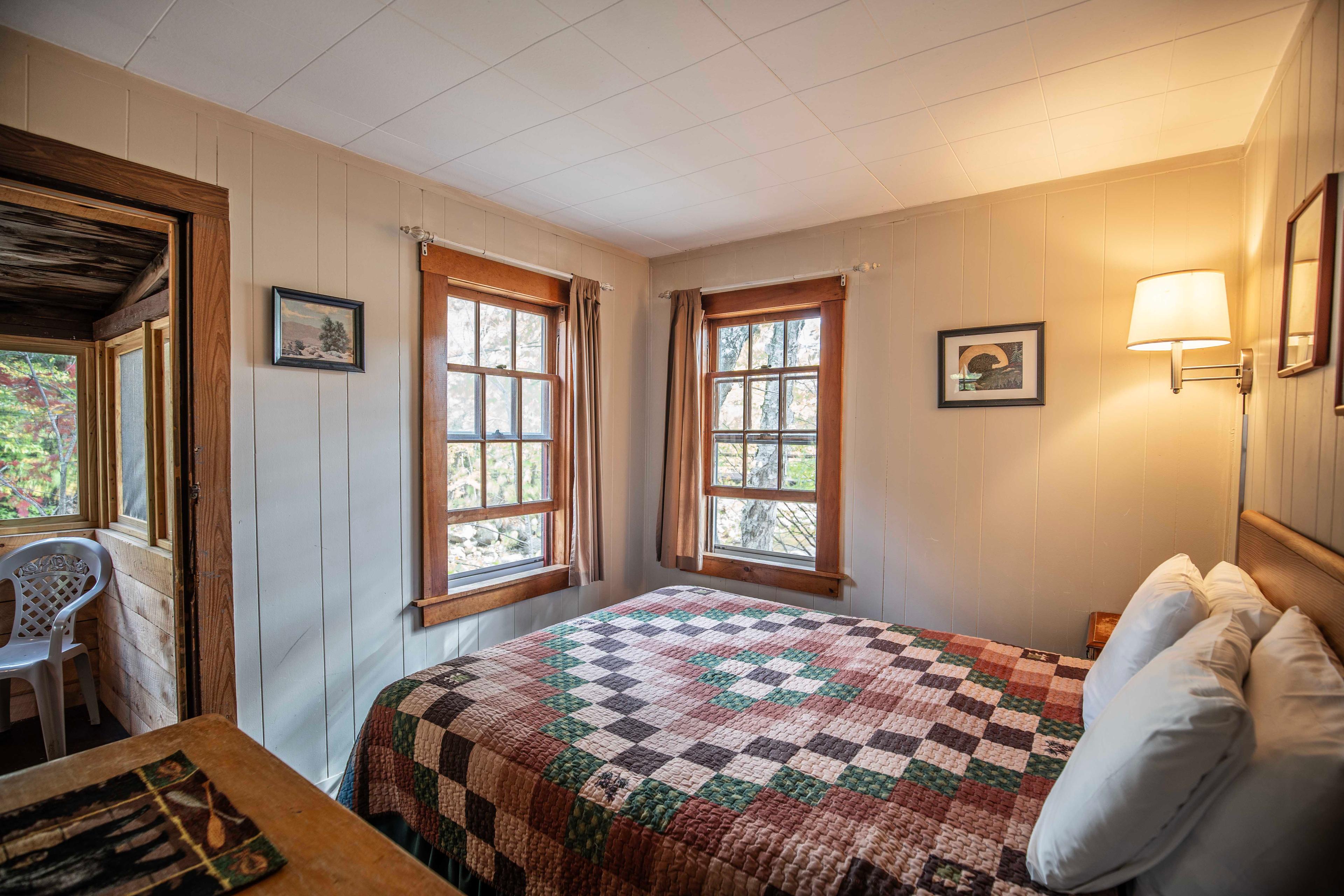 Family-friendly cabin with a playground and riverfront access at The Bears Den. #FamilyFun #RiverfrontCabin #RusticCharm #CozyCabin #Lincoln #Lincolnnh #nhlincolnhotel