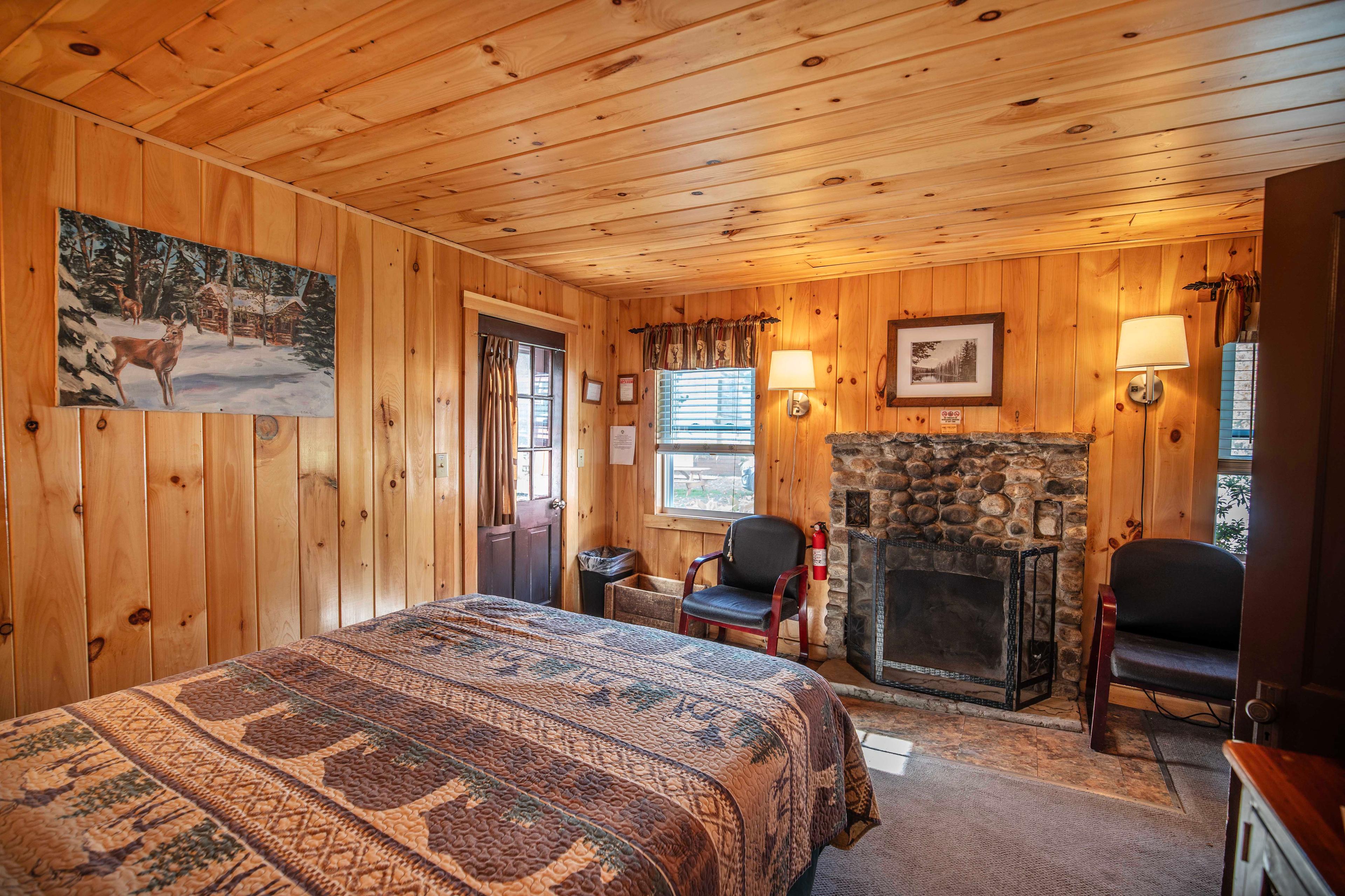 Year-round comfort with heating and wood-burning fireplace in Deer Haven cabin. #LincolnNH #WhiteMountains #CabinRetreat #NatureEscape