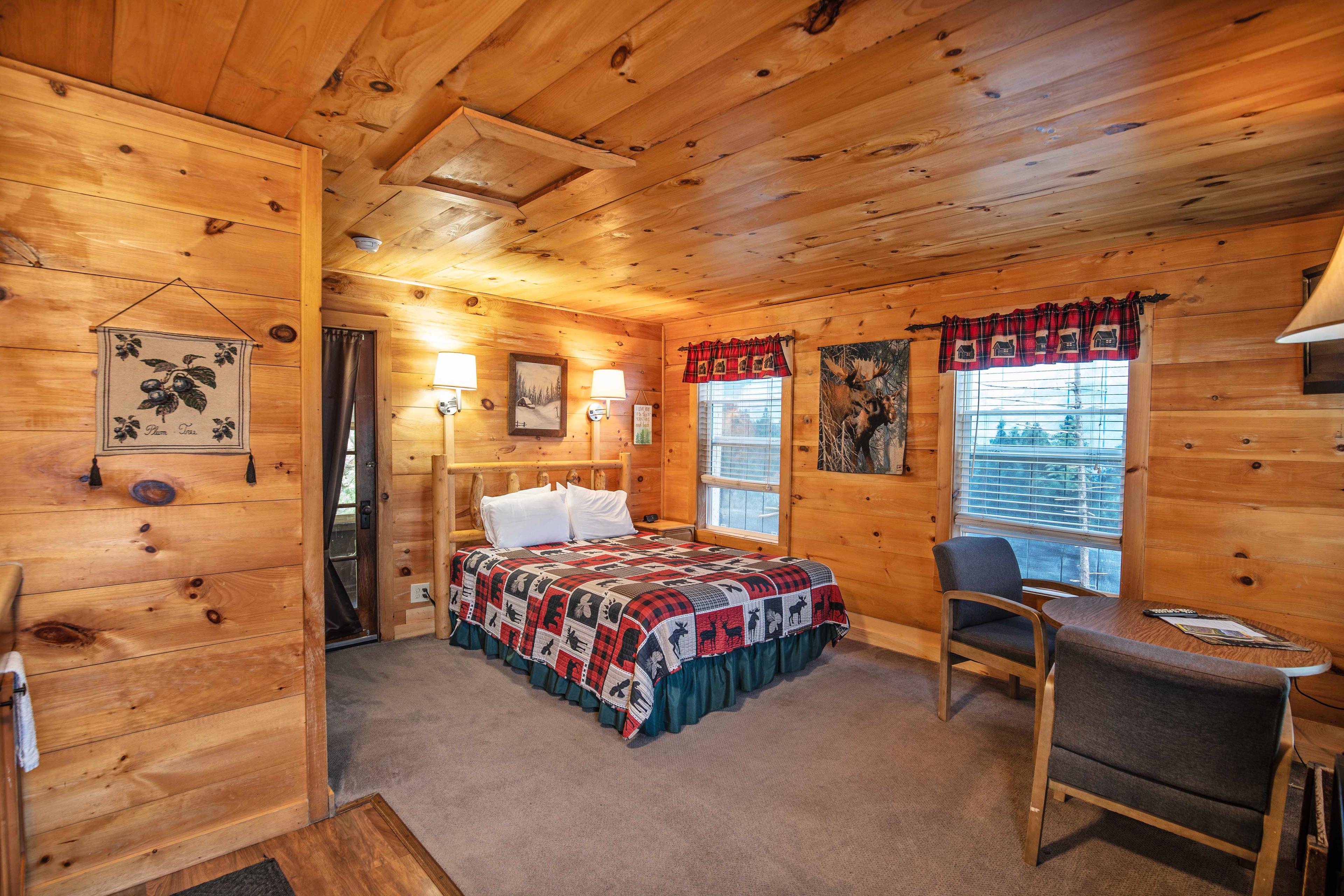 Riverside cabin with all the comforts of home at Beaver Pond. #YearRoundComfort #VacationRental #MountainRetreat #RomanticGetaway