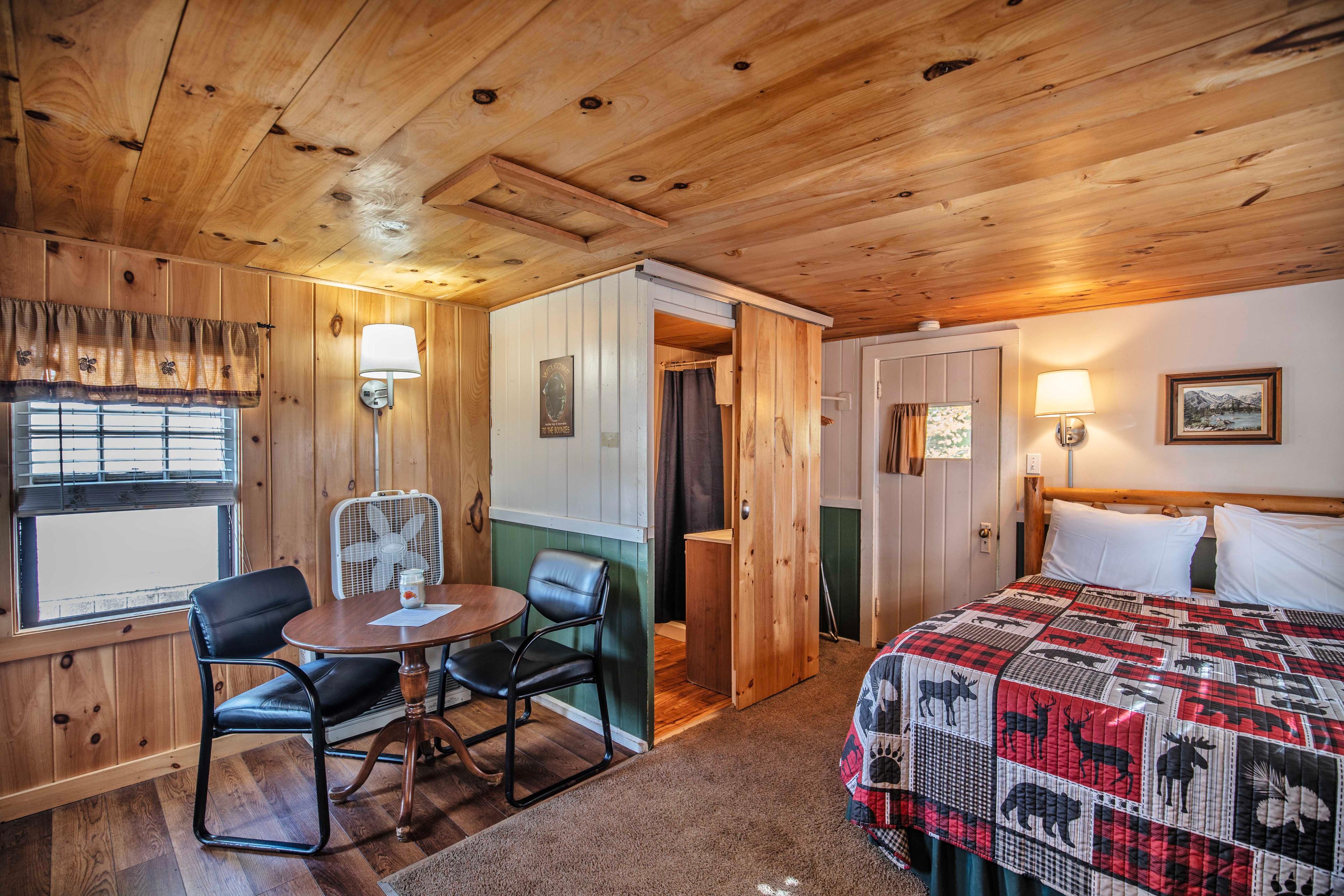 Prepare simple snacks and beverages in The Basin cabin's kitchenette. #RusticCharm #NatureLovers #CabinGetaway #ScenicViews