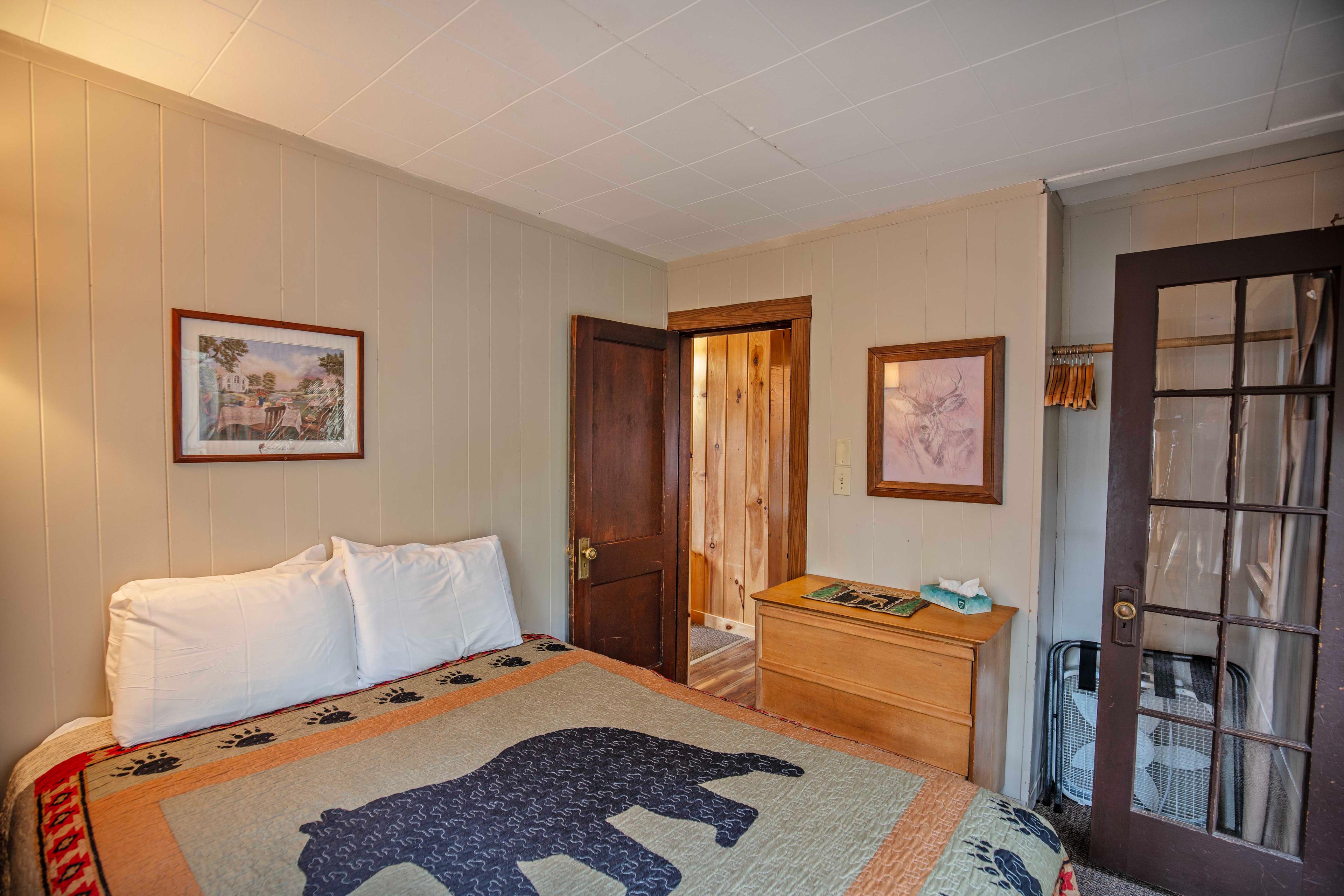 Two-bedroom cabin with queen-sized beds at The Moose's Antler. #CabinGetaway #ScenicViews #YearRoundComfort #VacationRental