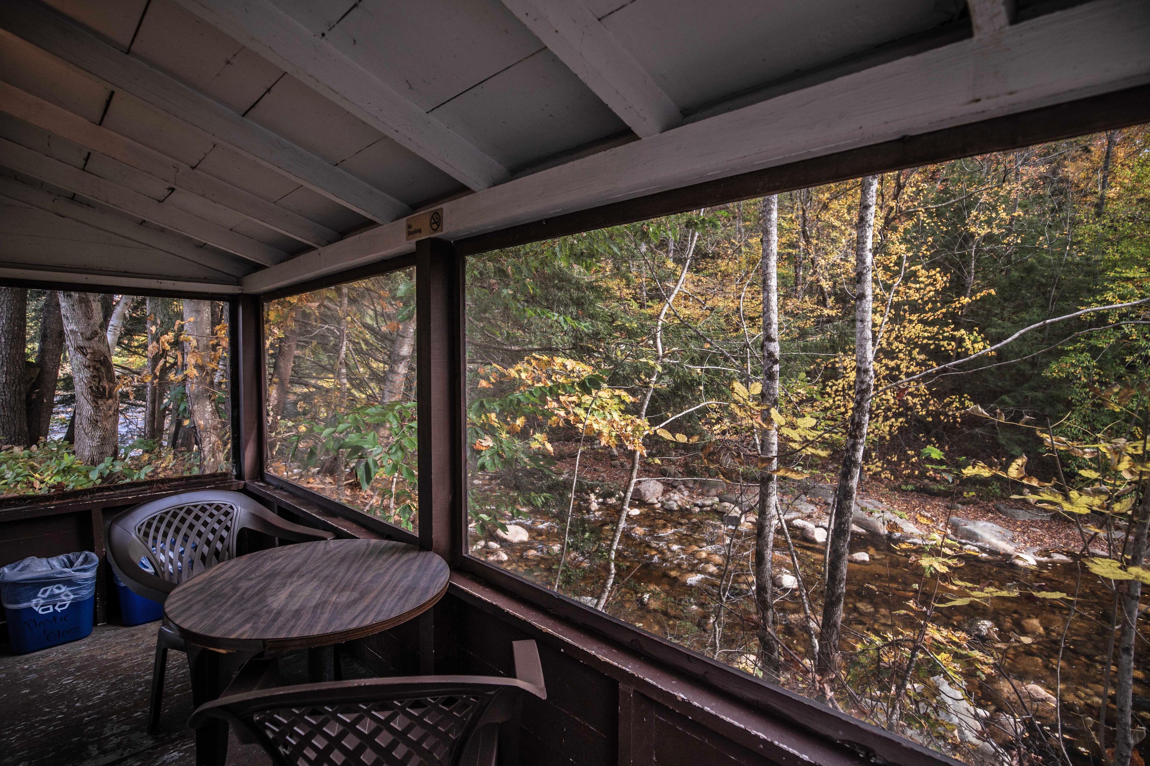 Enjoy nature's beauty from Cathedral Ledge cabin in Lincoln, NH. #TranquilSetting #NatureLovers #RomanticDinner #CabinVacation