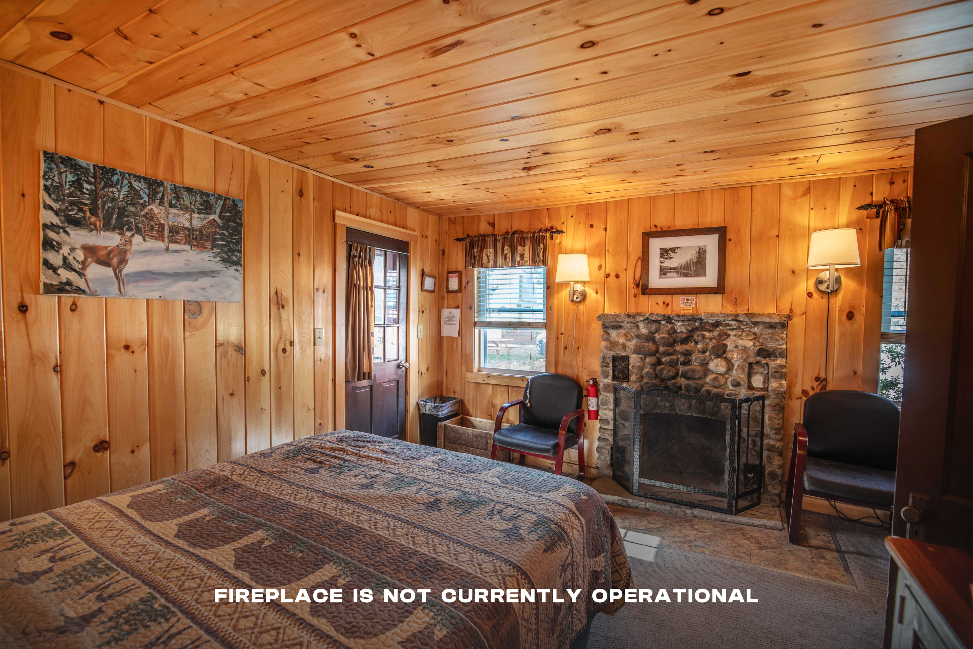 Year-round comfort with heating and wood-burning fireplace in Deer Haven cabin. #LincolnNH #WhiteMountains #CabinRetreat #NatureEscape