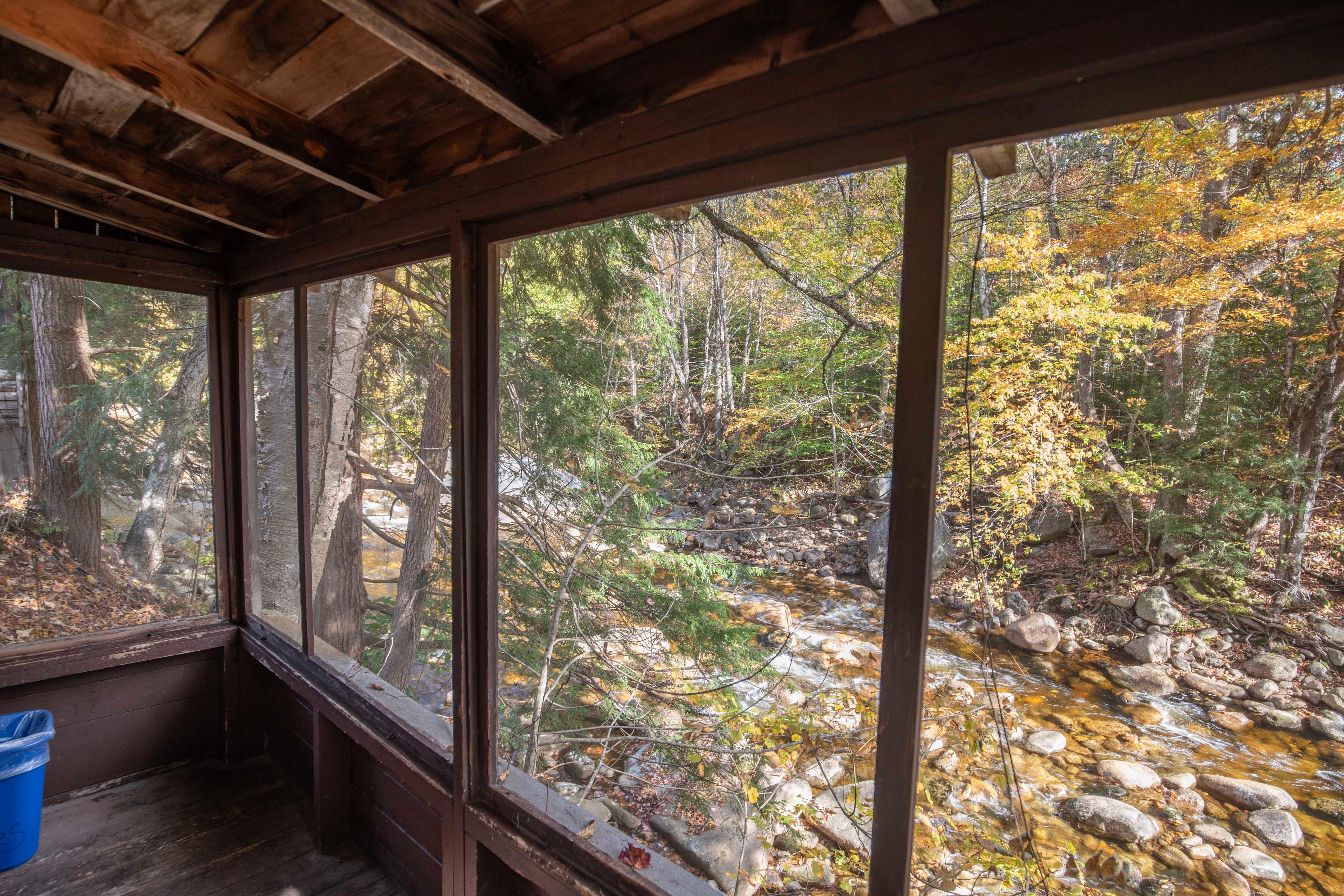 Quaint and rustic Deer Haven cabin on the Pemigewasset River. #HiddenGem #NatureBeauty #AdventureAwaits #EscapeToNature