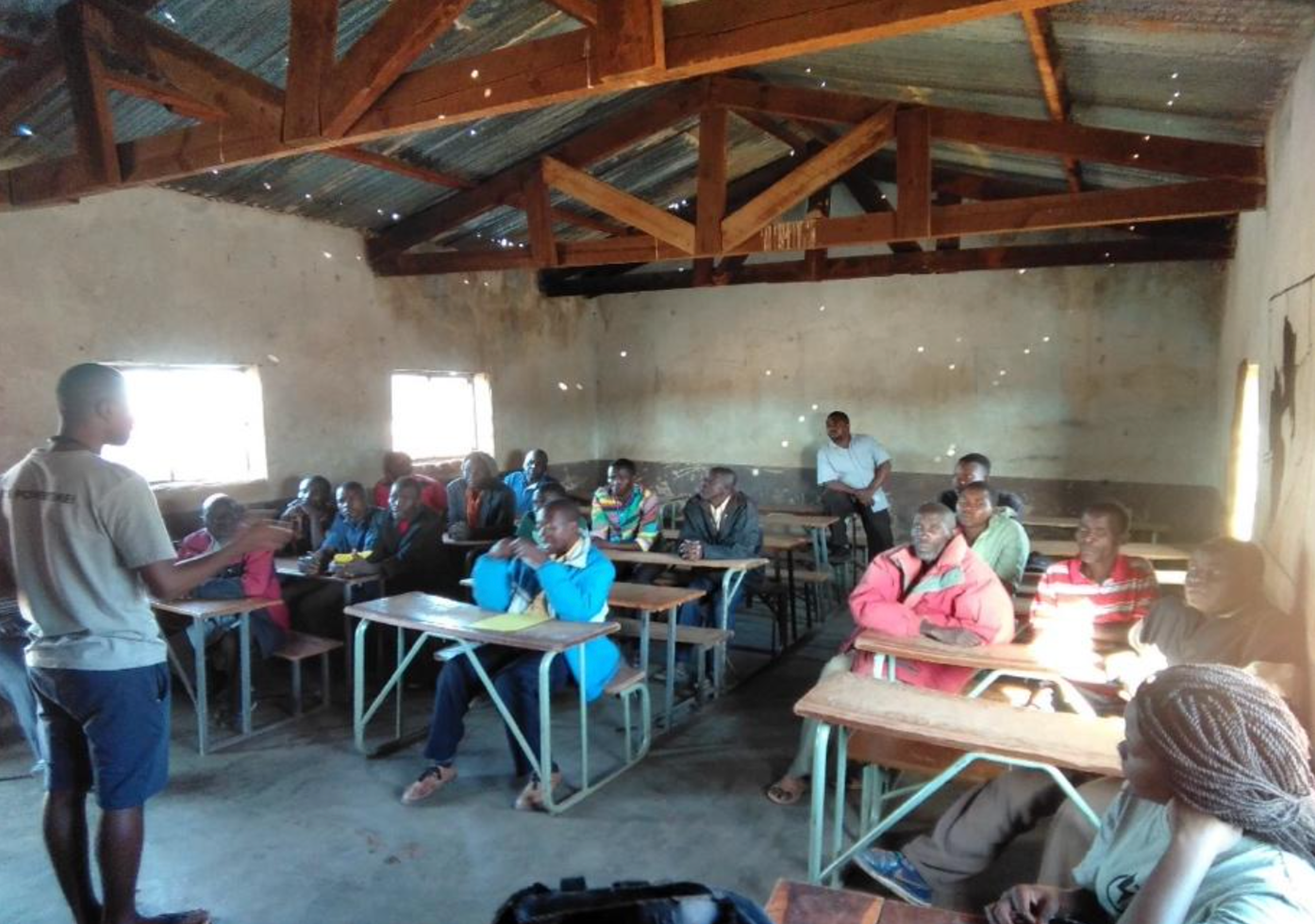 GreenMax team leading community focus group in Zambia