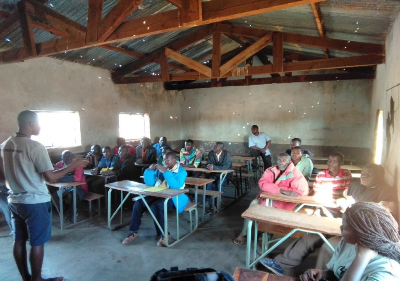 GreenMax team leading community focus group in Zambia