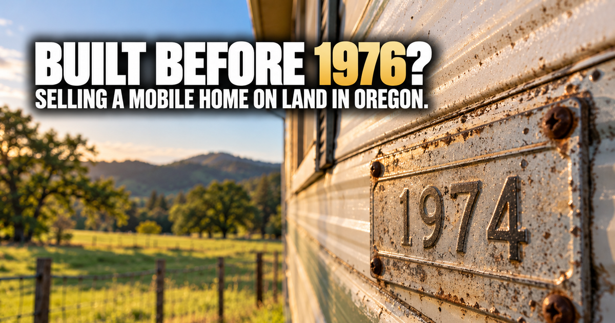 Selling a mobile home on land in Oregon: a weathered metal plate stamped 1974 on the siding of an old mobile home, with a fenced pasture and oak-covered hills behind it