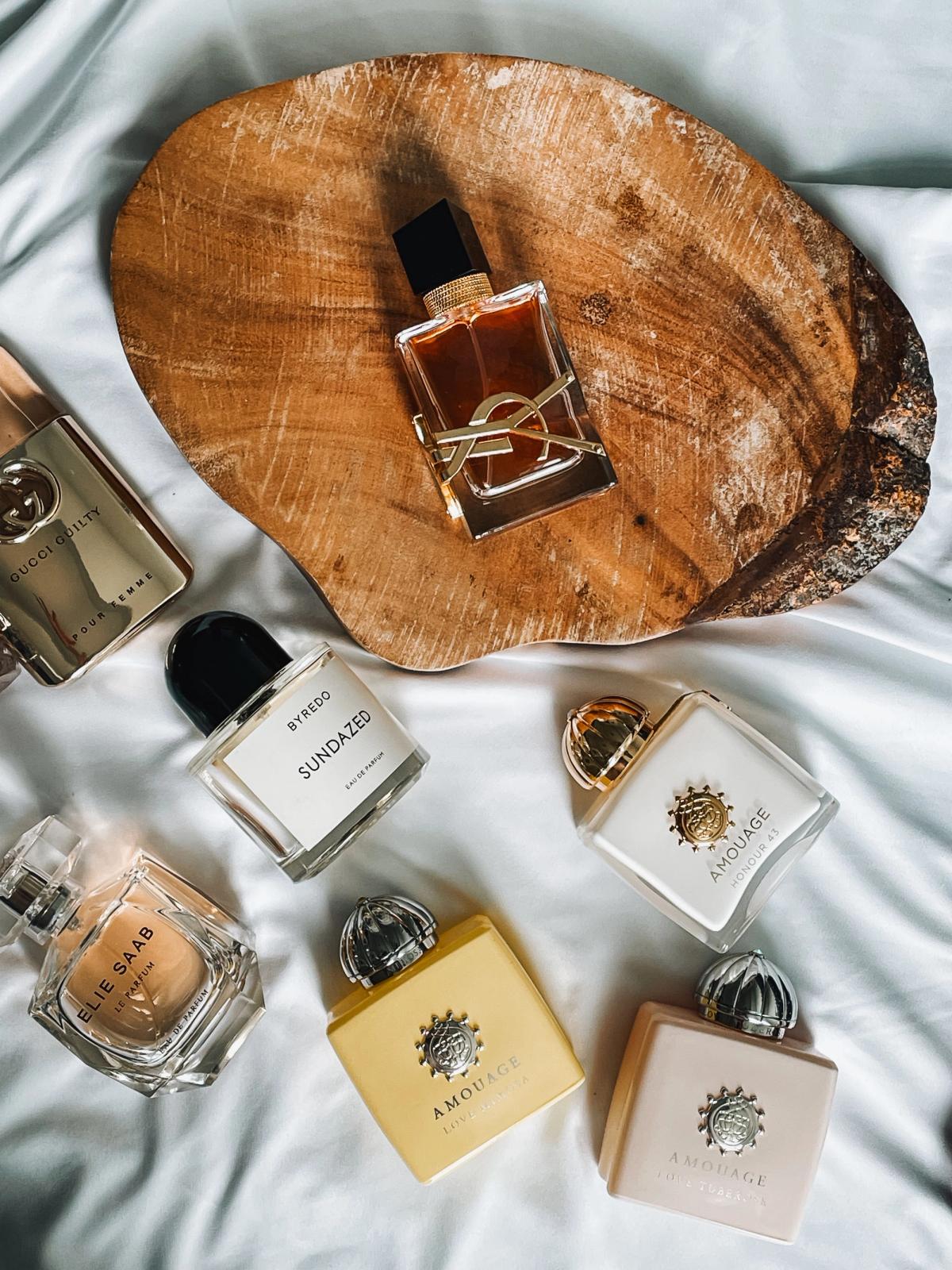 Men's colognes laid out elegantly