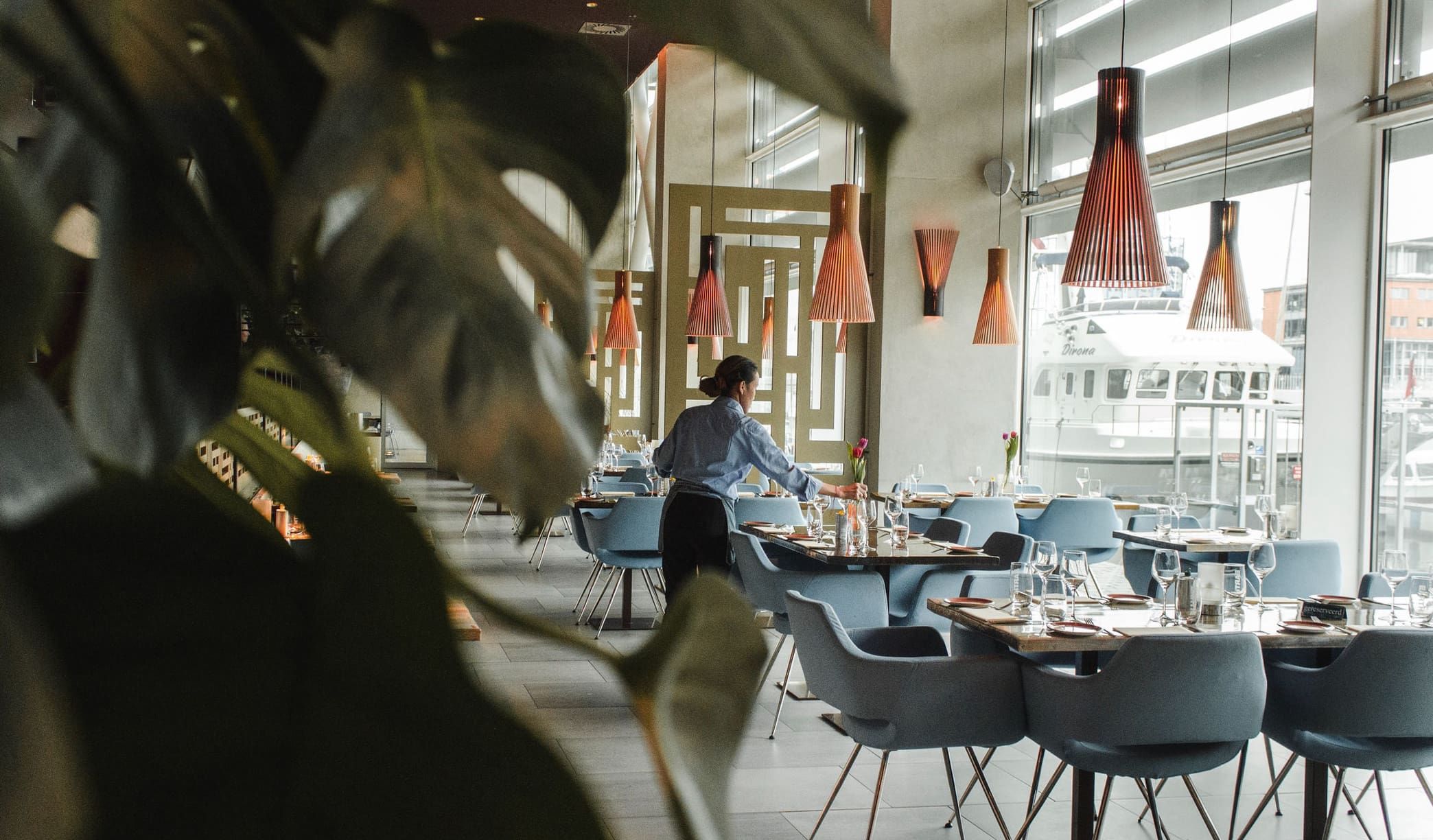 Waitress preparing a table