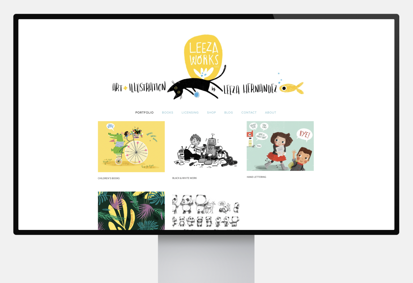 A white portfolio with a yellow logo and a drawing of a black cat. Children's books illustrations are displayed in a grid.