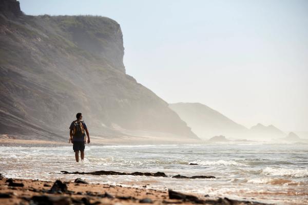 Paulo Palhota, founder, owner and Guide at Farol Discover, hiking along a Rota Vicentina Trail in Portugal